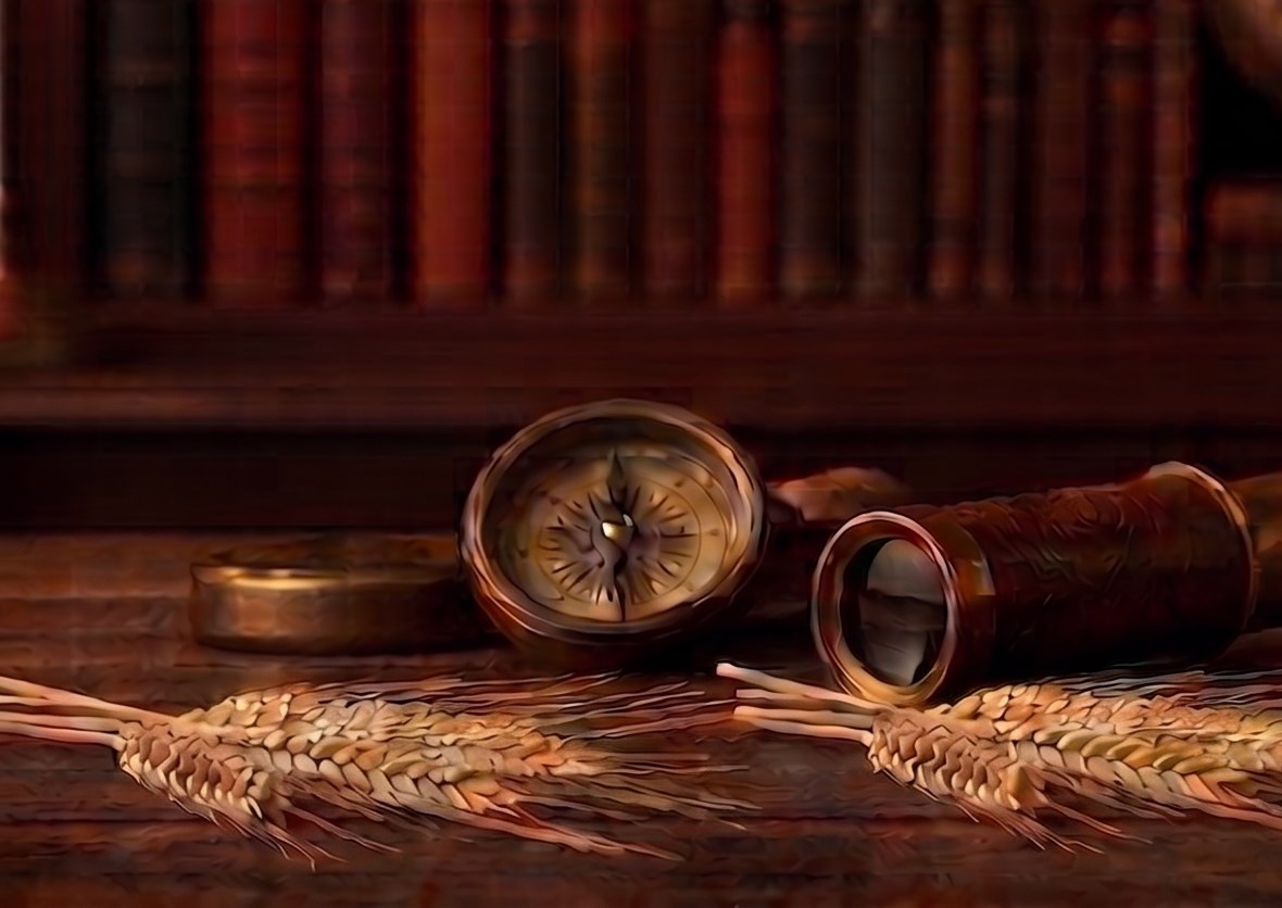 A brass compass and spyglass on a study desk, with ears of barley laid across it and a wall of old books behind